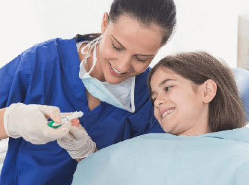 Praca dentysty dziecięcego